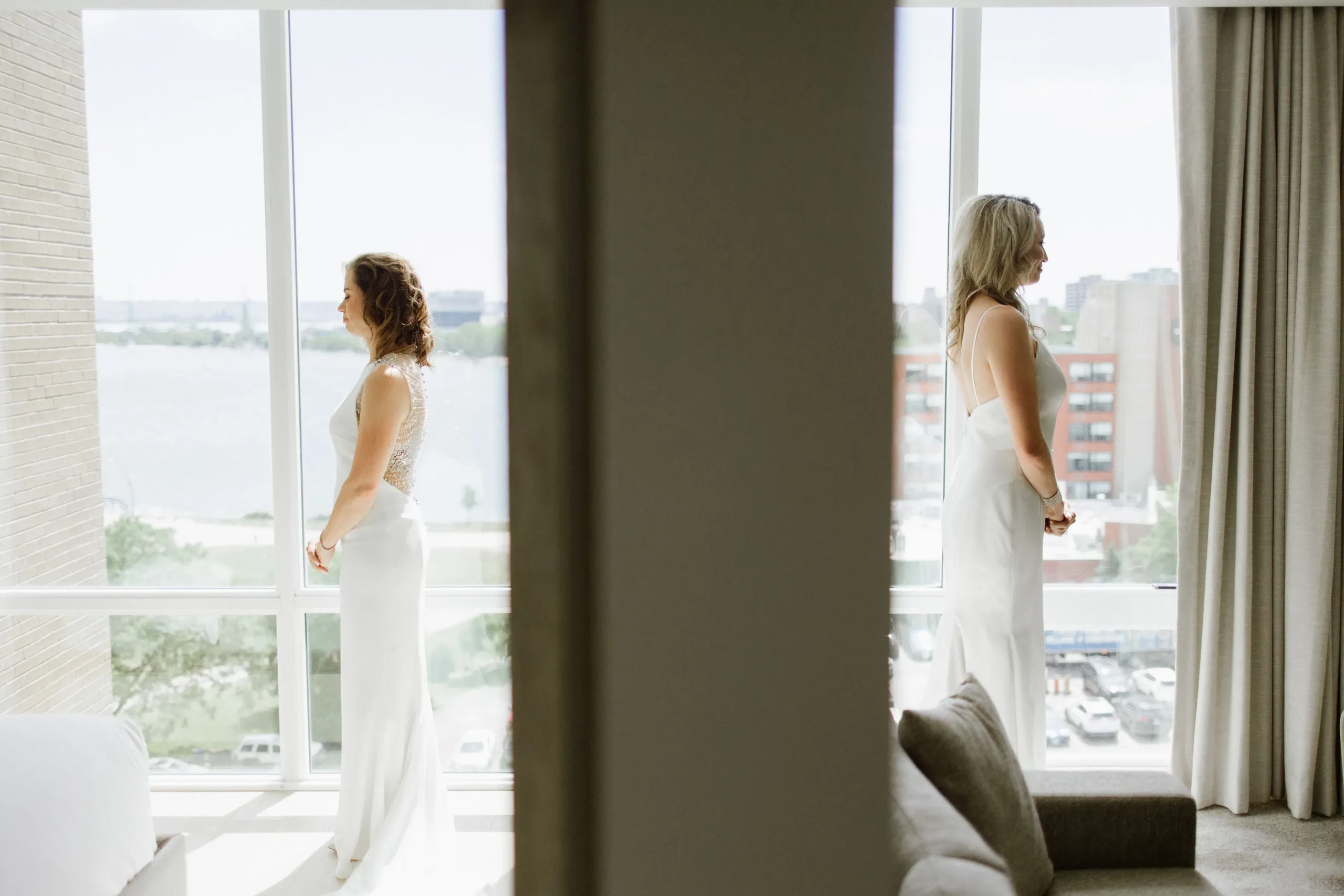 brides waiting for first look in hotel suite