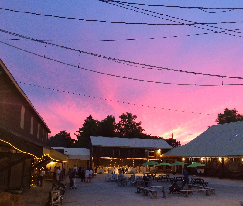 sunset over the courtyard reception at glen drummond farm