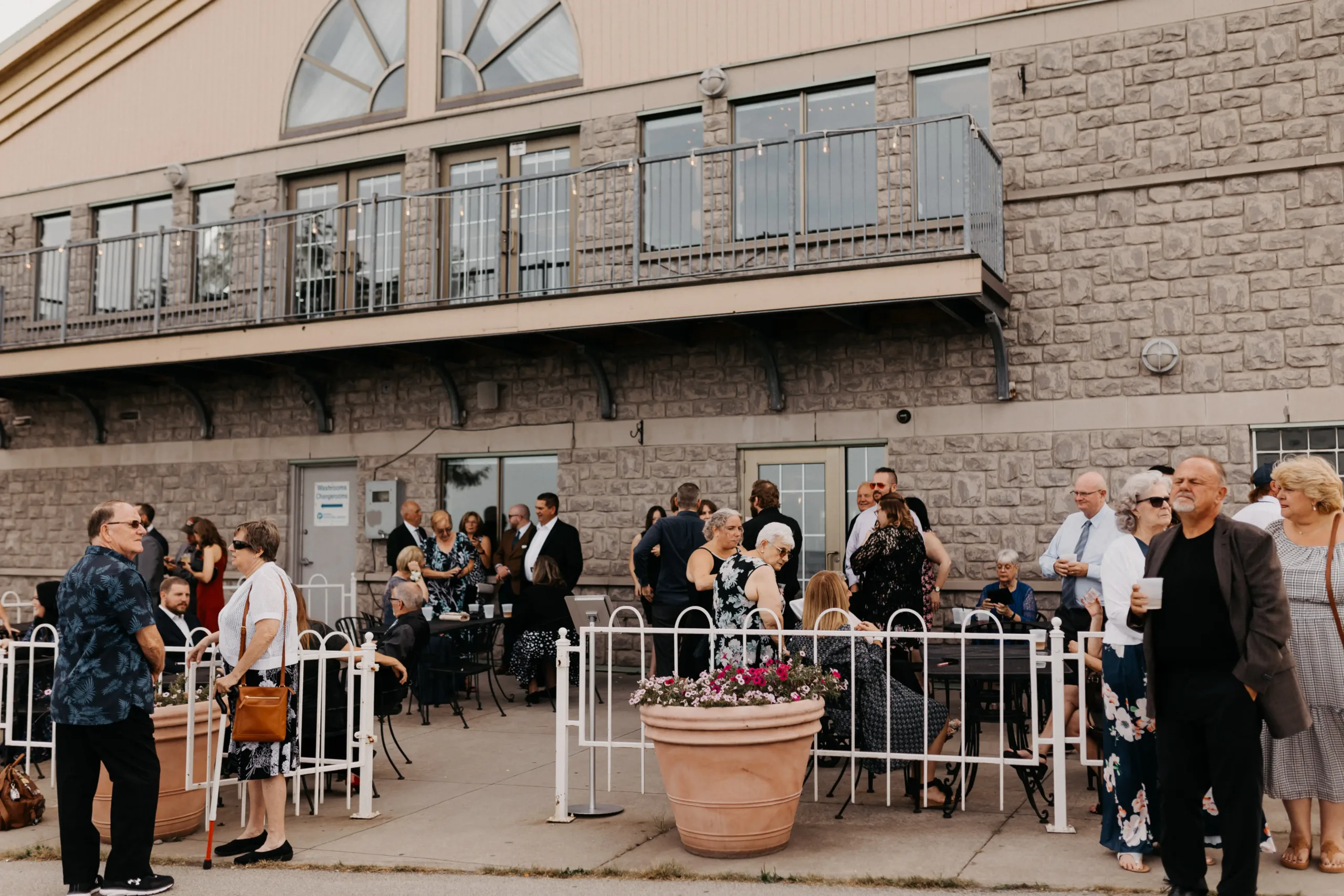 guests on patio outside the lakeview